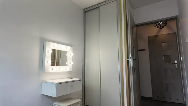 Bedroom — dressing table and wardrobe — flat at 37 Żeromskiego St, Gdynia